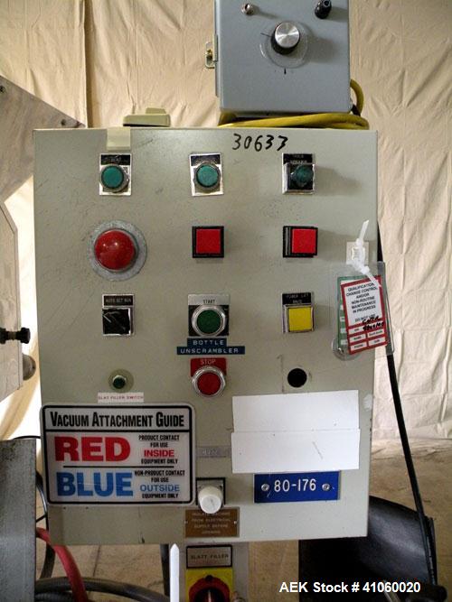 Used King SC6L Tablet or Capsule Slat Counter capable of speeds up to 120 bottles per minute. Has pin indexing with 4" wide x 114" long table top chain indexing conveyor. Tablet size range: 3 - 25mm....
