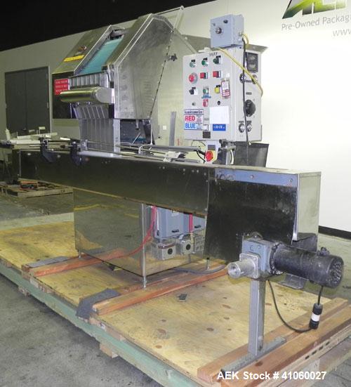 Used King SC6L Tablet or Capsule Slat Counter. Capable of speeds up to 120 bottles per minute. Has pin indexing with 4" wide x 114" long table top chain indexing conveyor. Tablet size range: 3 - 25 m...