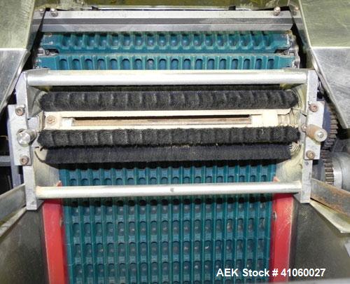Used King SC6L Tablet or Capsule Slat Counter. Capable of speeds up to 120 bottles per minute. Has pin indexing with 4" wide x 114" long table top chain indexing conveyor. Tablet size range: 3 - 25 m...