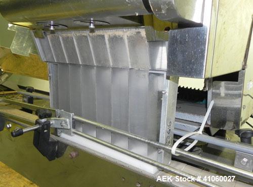 Used King SC6L Tablet or Capsule Slat Counter. Capable of speeds up to 120 bottles per minute. Has pin indexing with 4" wide x 114" long table top chain indexing conveyor. Tablet size range: 3 - 25 m...