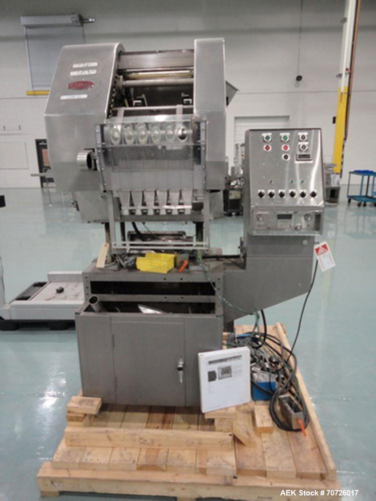 Used King SC6L Tablet or Capsule Slat Counter capable of speeds up to 120 bottles per minute. Has pin indexing. Tablet size range: 3 - 25 mm. Capsule size range: 0 - 5. Container size range: diameter...