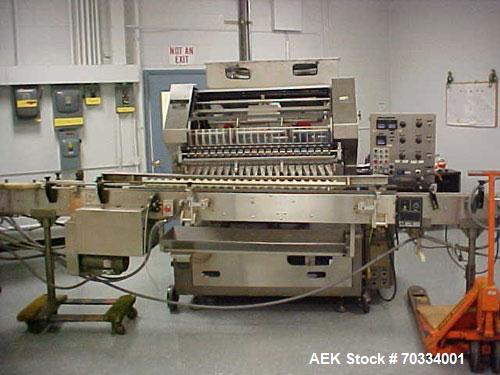 Used Used: Lakso 990 Slat Counter accepts 42” slats, positive pin ejection, swing arm pendant control panel, 22’ x 3 ¼” conveyor, and timing screw container handling. Currently fitted with 20 drop up...