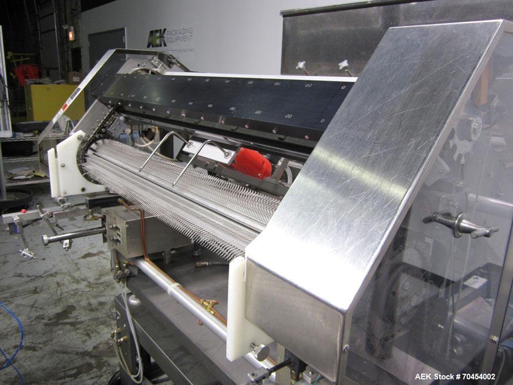Used Lakso 990 (Model 93) Slat Counter. Is a dual lane unit with dual wormscrew infeed and gating device. Machine is capable of speeds over 300 bottles per minute. Has Lakso "Micro-Scan" empty cavity...