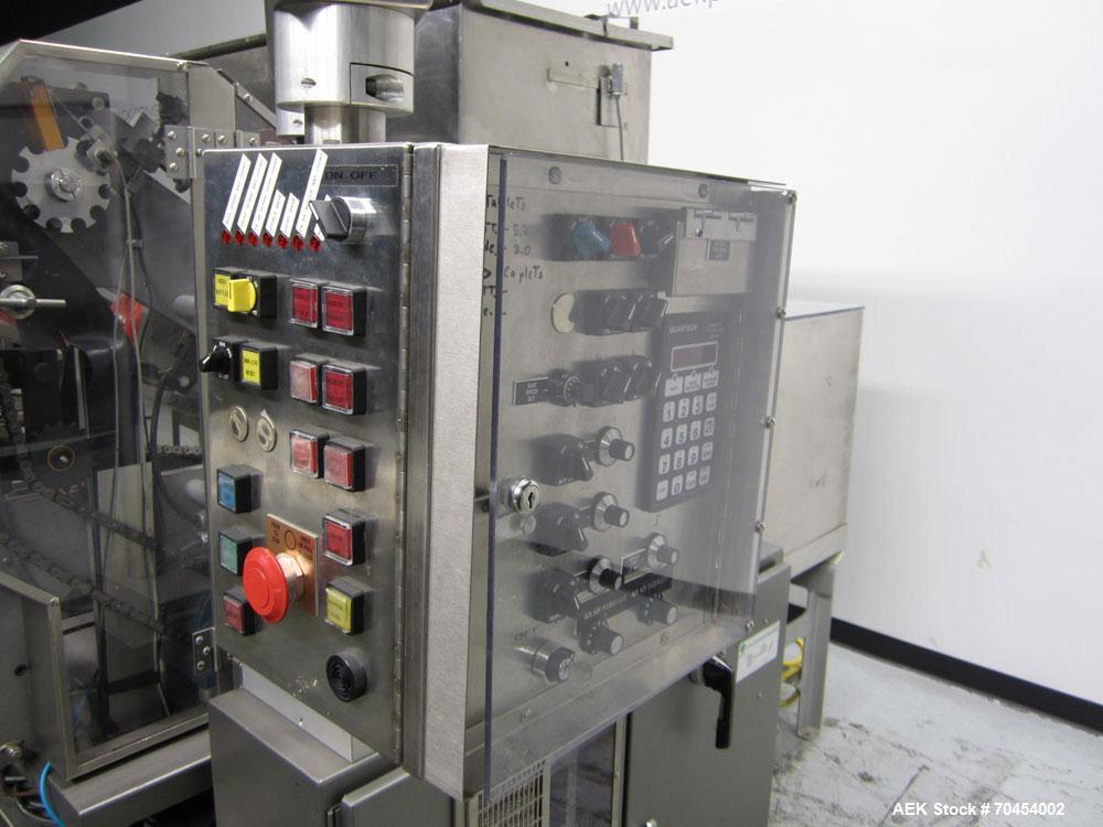 Used Lakso 990 (Model 93) Slat Counter. Is a dual lane unit with dual wormscrew infeed and gating device. Machine is capable of speeds over 300 bottles per minute. Has Lakso "Micro-Scan" empty cavity...