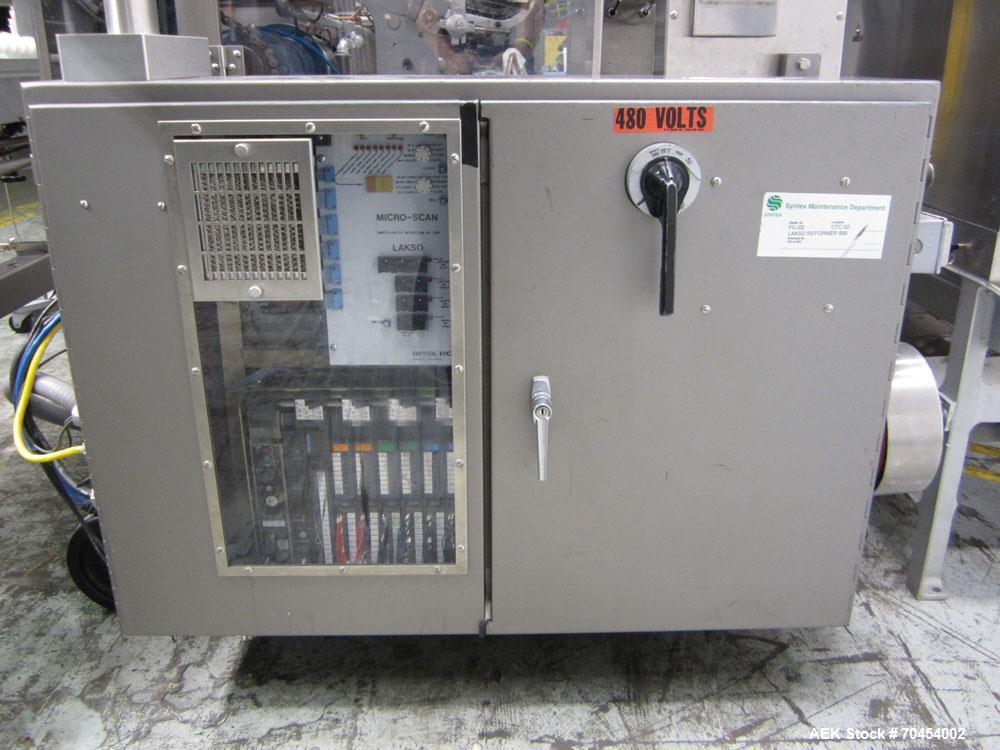 Used Lakso 990 (Model 93) Slat Counter. Is a dual lane unit with dual wormscrew infeed and gating device. Machine is capable of speeds over 300 bottles per minute. Has Lakso "Micro-Scan" empty cavity...