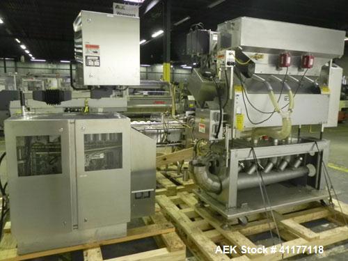 Used Merrill Model 40-39ADH Dual Lane Slat Counter. Machine is rated at up to 300 (100-count bottles per minute). Machine is all stainless steel. Allen Bradley PLC controls. Dual lane screw feed syst...