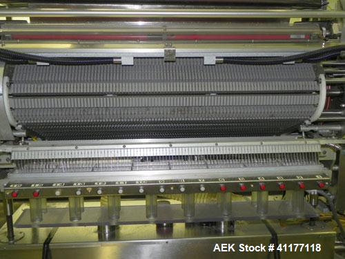 Used Merrill Model 40-39ADH Dual Lane Slat Counter. Machine is rated at up to 300 (100-count bottles per minute). Machine is all stainless steel. Allen Bradley PLC controls. Dual lane screw feed syst...