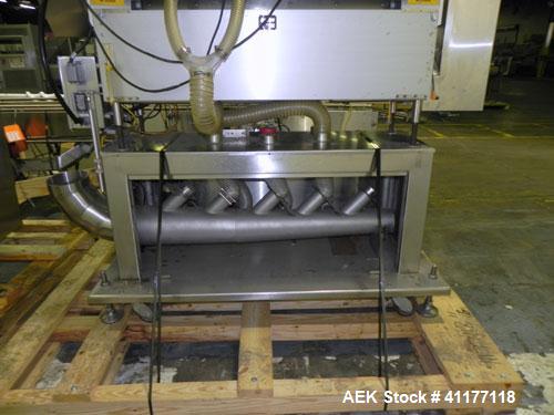 Used Merrill Model 40-39ADH Dual Lane Slat Counter. Machine is rated at up to 300 (100-count bottles per minute). Machine is all stainless steel. Allen Bradley PLC controls. Dual lane screw feed syst...