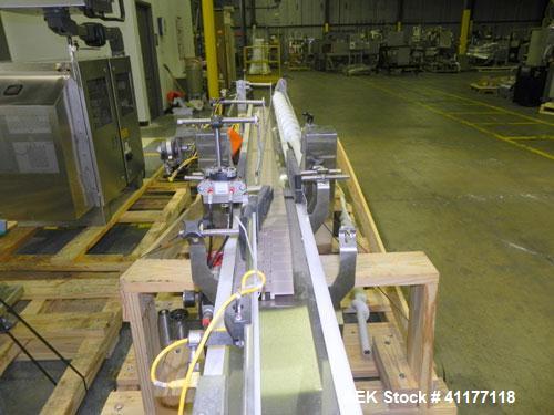 Used Merrill Model 40-39ADH Dual Lane Slat Counter. Machine is rated at up to 300 (100-count bottles per minute). Machine is all stainless steel. Allen Bradley PLC controls. Dual lane screw feed syst...