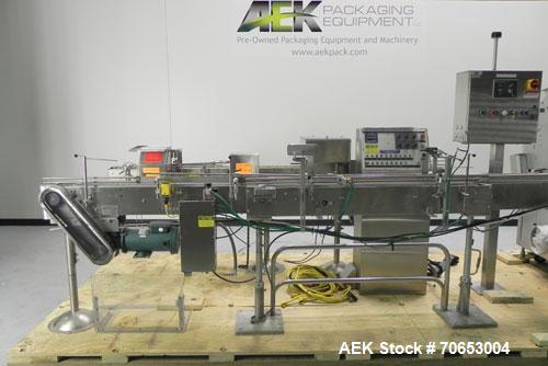 Used Merrill-Pennwalt (IMA) Model 72-16A Slat Counter capable of speeds up to 150 containers per minute. Has pin indexing system with Garvey table top indexing conveyor. Has stand alone stainless ste...