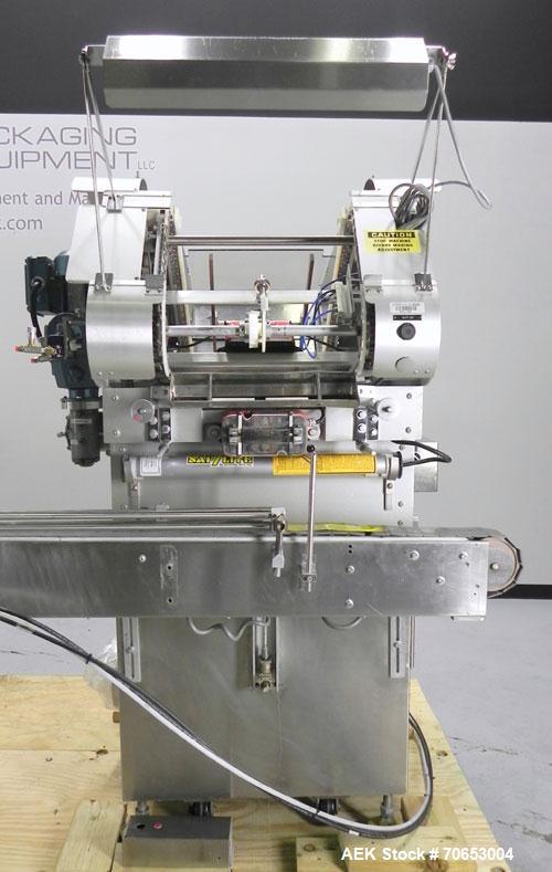 Used Merrill-Pennwalt (IMA) Model 72-16A Slat Counter capable of speeds up to 150 containers per minute. Has pin indexing system with Garvey table top indexing conveyor. Has stand alone stainless ste...