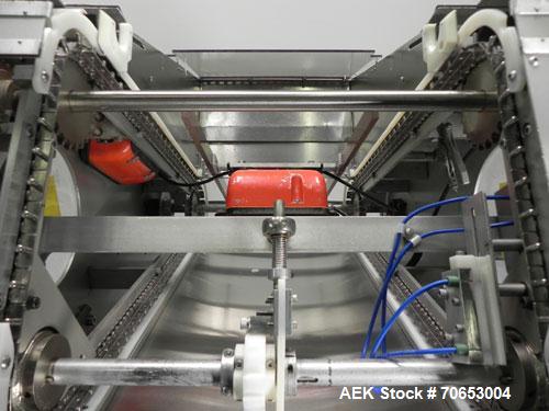Used Merrill-Pennwalt (IMA) Model 72-16A Slat Counter capable of speeds up to 150 containers per minute. Has pin indexing system with Garvey table top indexing conveyor. Has stand alone stainless ste...