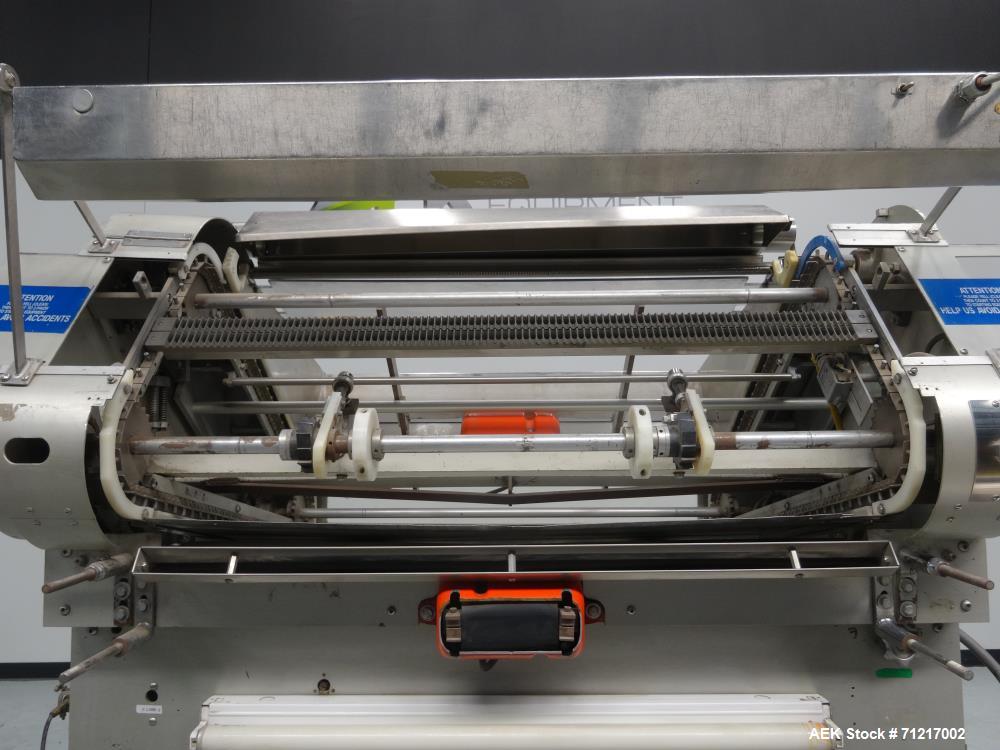 Used Merrill Dual Lane Slat Counter, Model 72-39 AD.