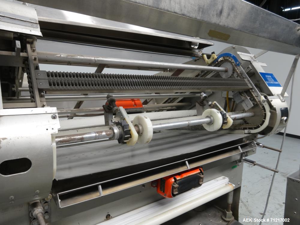 Used Merrill Dual Lane Slat Counter, Model 72-39 AD.