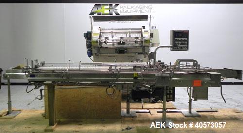 Used Merrill Model 72-39 AH Dual Lane Slat Counter. Machine is capable of speeds up to 300 bottles per minute. Has dual screw indexing system. Has Allen Bradley MicroLogix 1000 PLC controls. Has pin-...