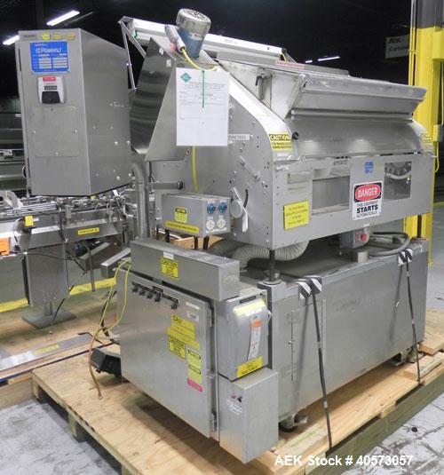 Used Merrill Model 72-39 AH Dual Lane Slat Counter. Machine is capable of speeds up to 300 bottles per minute. Has dual screw indexing system. Has Allen Bradley MicroLogix 1000 PLC controls. Has pin-...