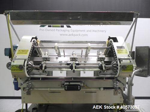 Used Merrill Model 72-39 AH Dual Lane Slat Counter. Machine is capable of speeds up to 300 bottles per minute. Has dual screw indexing system. Has Allen Bradley MicroLogix 1000 PLC controls. Has pin-...