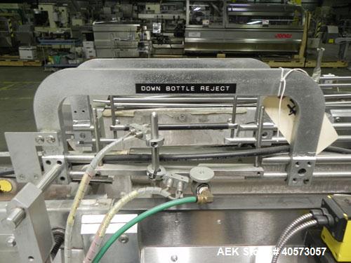 Used Merrill Model 72-39 AH Dual Lane Slat Counter. Machine is capable of speeds up to 300 bottles per minute. Has dual screw indexing system. Has Allen Bradley MicroLogix 1000 PLC controls. Has pin-...