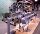 Used Merrill Model 72 39 AH Dual Lane Slat Counter. Has dual screw indexing system, AB PLC controls, pin discharge and dual lane gating conveyor.sn 588
