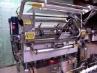 Used Merrill Model 72 39 AH Dual Lane Slat Counter. Has dual screw indexing system, AB PLC controls, pin discharge and dual lane gating conveyor.sn 588