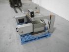 Used Aylward Capsule Feeder Station 
