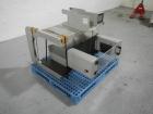 Used Aylward Capsule Feeder Station 