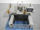 Used Aylward Capsule Feeder Station 