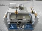 Used Aylward Capsule Feeder Station 