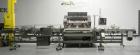 Used Lakso 990 (Model 93) Slat Counter. Is a dual lane unit with dual wormscrew infeed and gating device. Machine is capable of speeds over 300 bottles per minute. Has Lakso 