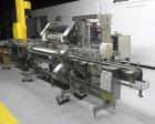 Used Lakso 990 (Model 93) Slat Counter. Is a dual lane unit with dual wormscrew infeed and gating device. Machine is capable of speeds over 300 bottles per minute. Has Lakso 