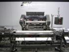 Used Lakso 990 (Model 93) Slat Counter. Is a dual lane unit with dual wormscrew infeed and gating device. Machine is capable of speeds over 300 bottles per minute. Has Lakso 