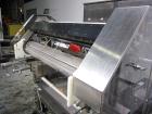 Used Lakso 990 (Model 93) Slat Counter. Is a dual lane unit with dual wormscrew infeed and gating device. Machine is capable of speeds over 300 bottles per minute. Has Lakso 