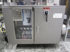 Used Lakso 990 (Model 93) Slat Counter. Is a dual lane unit with dual wormscrew infeed and gating device. Machine is capable of speeds over 300 bottles per minute. Has Lakso 