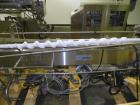 Used Merrill Model 40-39ADH Dual Lane Slat Counter. Machine is rated at up to 300 (100-count bottles per minute). Machine is all stainless steel. Allen Bradley PLC controls. Dual lane screw feed syst...