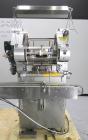 Used Merrill-Pennwalt (IMA) Model 72-16A Slat Counter capable of speeds up to 150 containers per minute. Has pin indexing system with Garvey table top indexing conveyor. Has stand alone stainless ste...