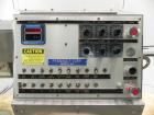 Used Merrill-Pennwalt (IMA) Model 72-16A Slat Counter capable of speeds up to 150 containers per minute. Has pin indexing system with Garvey table top indexing conveyor. Has stand alone stainless ste...