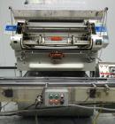 Used- Merrill Dual Lane Slat Counter, Model 72-39 AD.