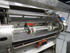 Used Merrill Dual Lane Slat Counter, Model 72-39 AD.