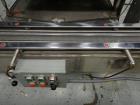 Used Merrill Dual Lane Slat Counter, Model 72-39 AD.