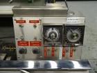 Used Merrill Dual Lane Slat Counter, Model 72-39 AD.