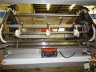 Used- Merrill 72-39A Dual Lane Slat Counter.