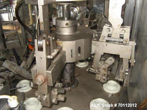 Used Comadis C-125 Plastic and Metal Tube Filler, rotary valve piston tube filler