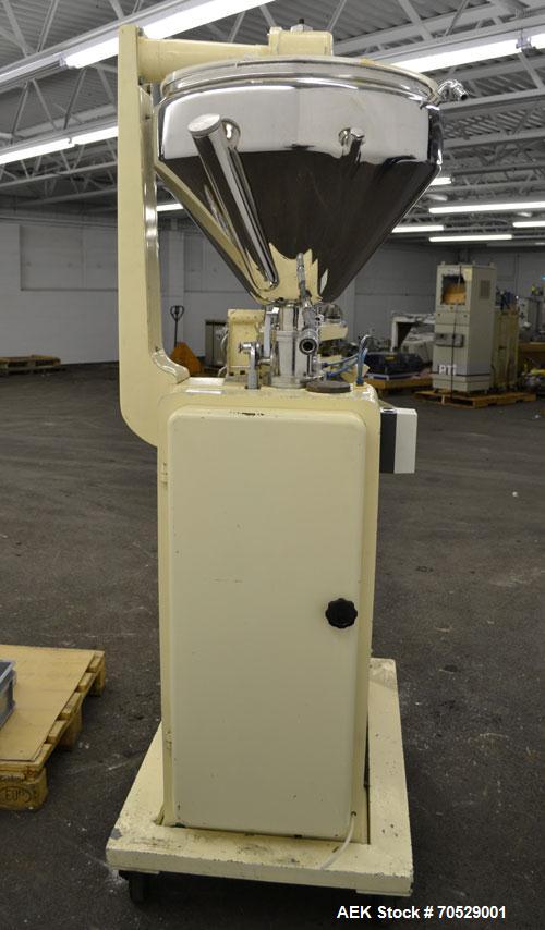 Used Kalix Automatic Metal Tube Filling Machine, Model KX-60. Capacity up to 50 tubes per minute. Maximum tube dimensions: 1-1/2" or 40mm diameter x 7" or 200mm height. Filling range: 2cc to 162cc wi...
