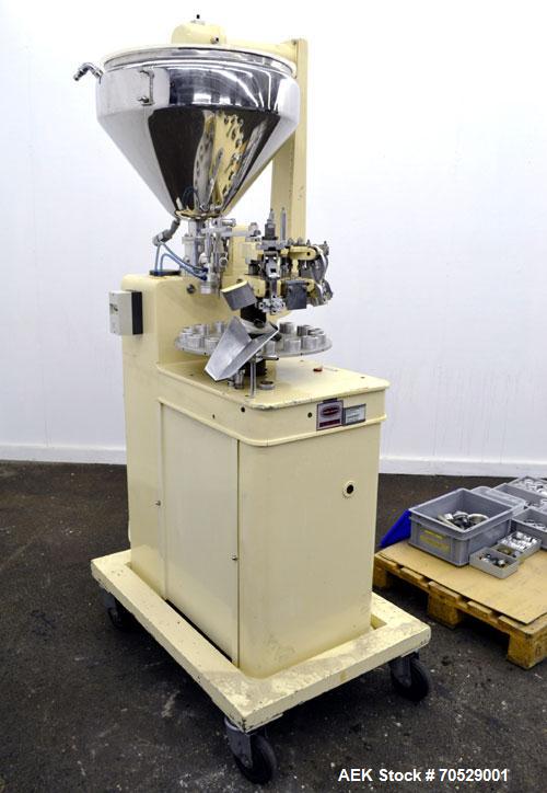 Used Kalix Automatic Metal Tube Filling Machine, Model KX-60. Capacity up to 50 tubes per minute. Maximum tube dimensions: 1-1/2" or 40mm diameter x 7" or 200mm height. Filling range: 2cc to 162cc wi...