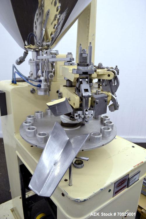 Used Kalix Automatic Metal Tube Filling Machine, Model KX-60. Capacity up to 50 tubes per minute. Maximum tube dimensions: 1-1/2" or 40mm diameter x 7" or 200mm height. Filling range: 2cc to 162cc wi...