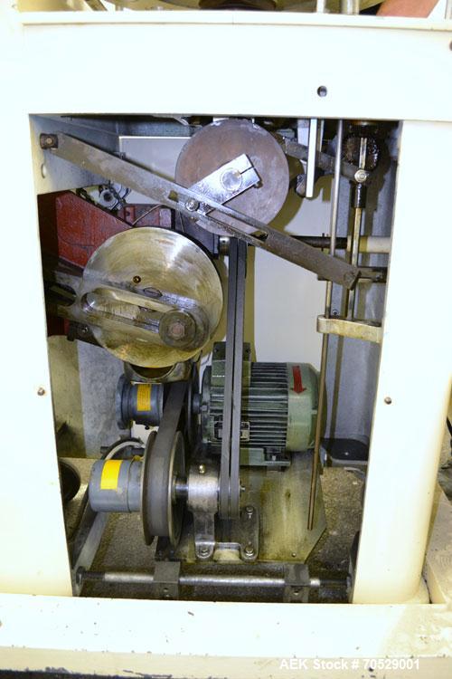 Used Kalix Automatic Metal Tube Filling Machine, Model KX-60. Capacity up to 50 tubes per minute. Maximum tube dimensions: 1-1/2" or 40mm diameter x 7" or 200mm height. Filling range: 2cc to 162cc wi...