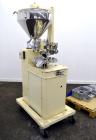 Used Kalix Automatic Metal Tube Filling Machine, Model KX-60. Capacity up to 50 tubes per minute. Maximum tube dimensions: 1-1/2