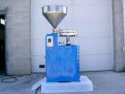 USED: Kalix model RV-7 tube filler. Includes pump for products up to approximately 150,000 cps, double reverse saddleback crimping station, jaw equipment with a slot to accept number bar to batch cod...