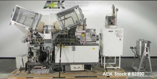 Used Arenco Model AM2000 Twin Piston Laminate Tube Filler. Currently equipped with high frequency sealer. Tubes are fed automatically through a dual tube magazine. Stations include tube cleaning, tub...