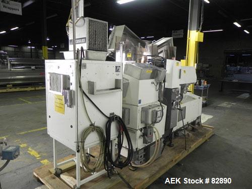 Used Arenco Model AM2000 Twin Piston Laminate Tube Filler. Currently equipped with high frequency sealer. Tubes are fed automatically through a dual tube magazine. Stations include tube cleaning, tub...